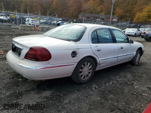 ✅ 2002 Lincoln Continental • VIN: 1LNHM97V52Y647247 • Lot: 90860765. Listed on Copart with Not provided. Free auction sales archive from the USA and detailed vehicle history report at DreamBid. Image 3.