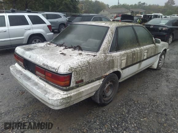 ✅ 1991 Toyota Camry • VIN: 4T1SV22E1MU450491 • Lot: 40356634. Wystawiony na IAAI z przebiegiem 285 677 mil. Bezpłatny archiwum sprzedaży aukcyjnych z USA i szczegółowy raport historii pojazdu na DreamBid. Zdjęcie 4.