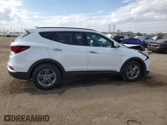 2018 Hyundai Santa Fe 2.4L z VIN 5NMZUDLB5JH065895, wystawiony jako Copart lot #85318895 z przebiegiem 54 993 mil mil oraz Szkoda całkowita • Salvage title. Historia ofert i sprzedaży dostępna na DreamBid. Obrazek 3.