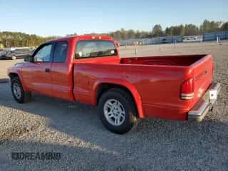 2002 Dodge Dakota SLT с VIN 1B7GL42N72S500329, выставлен на аукционе Copart как лот 75703164 с пробегом 159 391 миль миль и Списание • Salvage title. История ставок и продаж доступна на DreamBid. Изображение 2.