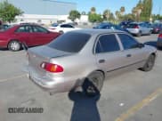 ✅ 2000 Toyota Corolla VE • VIN: 1NXBR12EXYZ343752 • Lot: 42896467. Listed on IAAI with 251,772 mi. Free auction sales archive from the USA and detailed vehicle history report at DreamBid. Image 4.