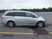 ✅ 2012 Honda Odyssey Touring • VIN: 5FNRL5H93CB122128 • Лот: 42206838. Опубликован ранее на IAAI с пробегом 181 605 миль. Бесплатный доступ к архиву аукционных продаж из США и подробный отчёт об истории автомобиля на DreamBid. Изображение 13.