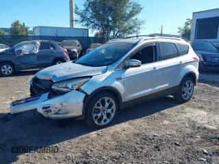 ✅ 2014 Ford Escape Titanium • VIN: 1FMCU9J91EUA81007 • Лот: 43549264. Опубликован ранее на IAAI с пробегом 73 029 миль. Бесплатный доступ к архиву аукционных продаж из США и подробный отчёт об истории автомобиля на DreamBid. Изображение 2.