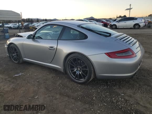 ✅ 2005 Porsche 911 Carrera 997 • VIN: WP0AA29975S716954 • Lot: 79488564. Wystawiony na Copart z przebiegiem 94 989 mil. Bezpłatny archiwum sprzedaży aukcyjnych z USA i szczegółowy raport historii pojazdu na DreamBid. Zdjęcie 2.