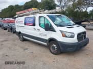 ✅ 2020 Ford Transit Cargo • VIN: 1FTBR1Y86LKA05064 • Lot: 43382385. Listed on IAAI with 209,307 mi. Free auction sales archive from the USA and detailed vehicle history report at DreamBid. Image 1.