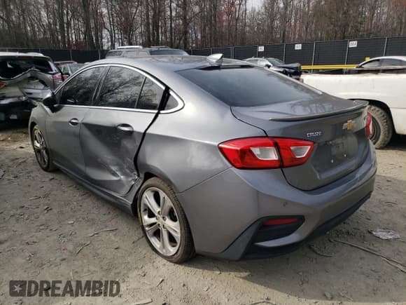 ✅ 2018 Chevrolet Cruze Premier • VIN: 1G1BF5SM5J7156010 • Lot: 46577323. Listed on Copart with 107,132 mi. Free auction sales archive from the USA and detailed vehicle history report at DreamBid. Image 2.