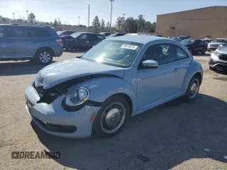 ✅ 2013 Volkswagen Beetle Fender Edition • VIN: 3VWJP7AT8DM673765 • Lot: 43014375. Listed on Copart with 72,859 mi. Free auction sales archive from the USA and detailed vehicle history report at DreamBid. Image 1.