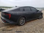 ✅ 2025 Kia K4 LXS • VIN: 3KPFT4DE6SE038244 • Lot: 82107825. Listed on Copart with 7,503 mi. Free auction sales archive from the USA and detailed vehicle history report at DreamBid. Image 3.