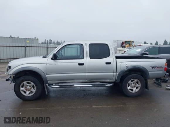 ✅ 2001 Toyota Tacoma PreRunner • VIN: 5TEGN92N51Z765722 • Lot: 43840661. Listed on IAAI with 205,791 mi. Free auction sales archive from the USA and detailed vehicle history report at DreamBid. Image 15.