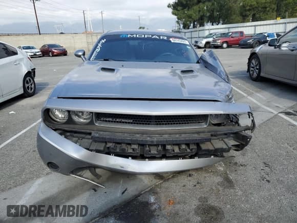 ✅ 2014 Dodge Challenger SXT • VIN: 2C3CDYAG1EH101194 • Lot: 84743424. Wystawiony na Copart z przebiegiem 135 233 mil. Bezpłatny archiwum sprzedaży aukcyjnych z USA i szczegółowy raport historii pojazdu na DreamBid. Zdjęcie 5.