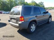 ✅ 2004 Ford Escape XLT • VIN: 1FMCU031X4DA18148 • Lot: 42566498. Listed on IAAI with 264,092 mi. Free auction sales archive from the USA and detailed vehicle history report at DreamBid. Image 4.