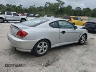 ✅ 2006 Hyundai Tiburon GS • VIN: KMHHM65D16U219309 • Лот: 86110765. Опубликован ранее на Copart с пробегом 166 452 миль. Бесплатный доступ к архиву аукционных продаж из США и подробный отчёт об истории автомобиля на DreamBid. Изображение 3.