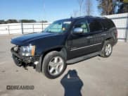 ✅ 2012 Chevrolet Tahoe LTZ • VIN: 1GNSCCE01CR276608 • Lot: 88820715. Listed on Copart with 112,976 mi. Free auction sales archive from the USA and detailed vehicle history report at DreamBid. Image 1.