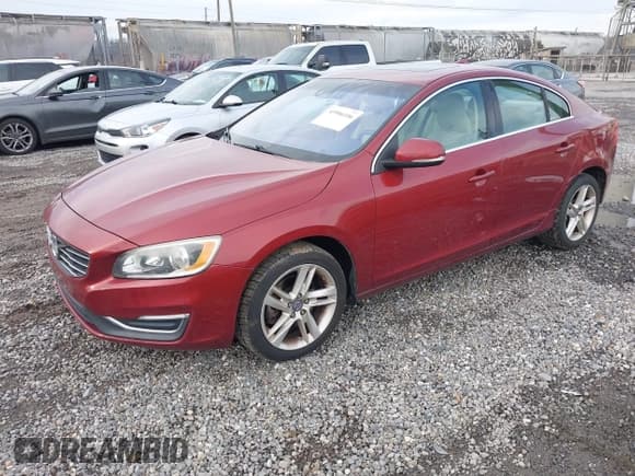 ✅ 2015 Volvo S60 T5 Drive-E Premier • VIN: YV126MFB7F1314474 • Lot: 43906106. Listed on IAAI with 124,588 mi. Free auction sales archive from the USA and detailed vehicle history report at DreamBid. Image 2.