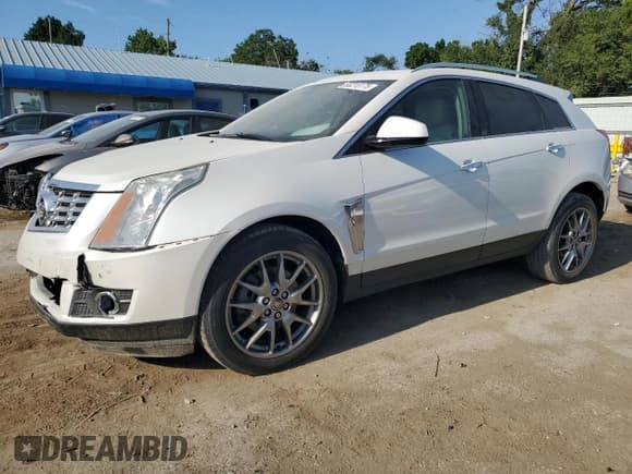 ✅ 2016 Cadillac SRX Premium Collection • VIN: 3GYFNDE32GS548343 • Lot: 63218175. Wystawiony na Copart z przebiegiem 91 265 mil. Bezpłatny archiwum sprzedaży aukcyjnych z USA i szczegółowy raport historii pojazdu na DreamBid. Zdjęcie 1.
