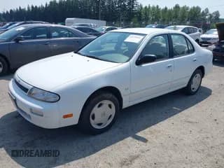 ✅ 1993 Nissan Altima GLE • VIN: 1N4BU31FXPC233738 • Lot: 42475896. Listed on IAAI with 159,382 mi. Free auction sales archive from the USA and detailed vehicle history report at DreamBid. Image 2.