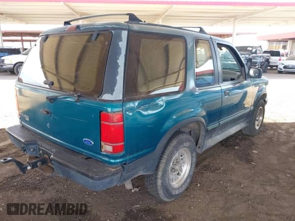 1994 Ford Explorer Eddie Bauer z VIN 1FMCU22X2RUC98656, wystawiony jako IAAI lot #41775781 z przebiegiem 140 598 mil mil oraz . Historia ofert i sprzedaży dostępna na DreamBid. Obrazek 4.