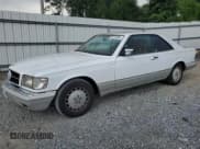✅ 1991 Mercedes-Benz 560 • VIN: WDBCA45E6MA583663 • Lot: 66163085. Wystawiony na Copart z przebiegiem 306 084 mil. Bezpłatny archiwum sprzedaży aukcyjnych z USA i szczegółowy raport historii pojazdu na DreamBid. Zdjęcie 1.