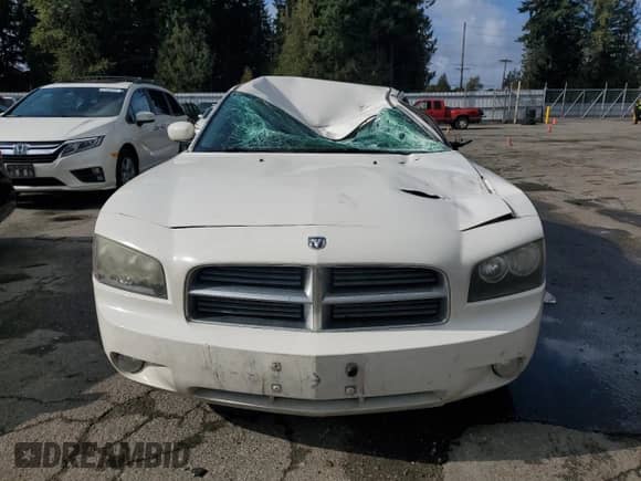 ✅ 2010 Dodge Charger SXT • VIN: 2B3CA3CV0AH155875 • Lot: 87068775. Listed on Copart with 220,120 mi. Free auction sales archive from the USA and detailed vehicle history report at DreamBid. Image 5.