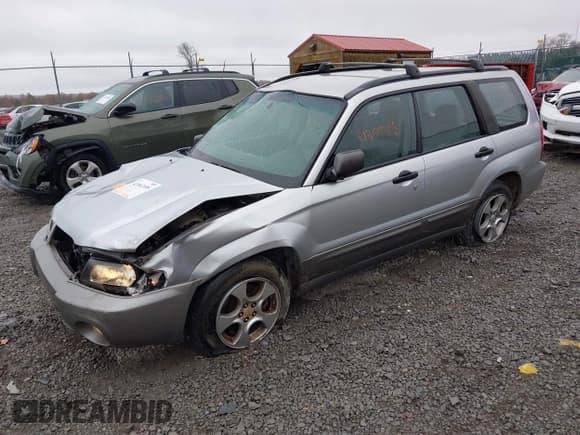 ✅ 2004 Subaru Forester XS • VIN: JF1SG65604H721338 • Lot: 43562108. Listed on IAAI with 194,707 mi. Free auction sales archive from the USA and detailed vehicle history report at DreamBid. Image 18.