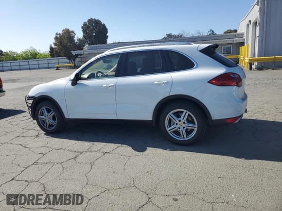 ✅ 2014 Porsche Cayenne S • VIN: WP1AB2A23ELA56531 • Lot: 55714545. Listed on Copart with 114,248 mi. Free auction sales archive from the USA and detailed vehicle history report at DreamBid. Image 2.