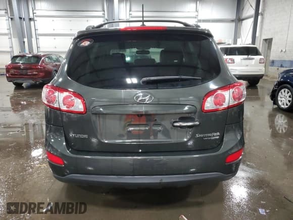 ✅ 2010 Hyundai Santa Fe Limited • VIN: 5NMSKDAG8AH385282 • Lot: 83102614. Listed on Copart with 156,299 mi. Free auction sales archive from the USA and detailed vehicle history report at DreamBid. Image 6.