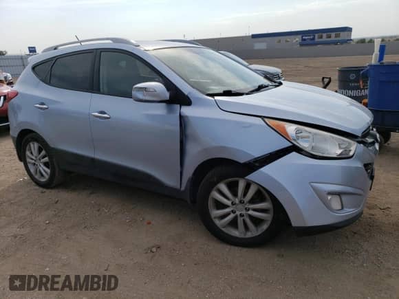 2011 Hyundai Tucson Limited z VIN KM8JU3AC3BU127903, wystawiony jako Copart lot #70695114 z przebiegiem 130 796 mil mil oraz Szkoda całkowita • Salvage title. Historia ofert i sprzedaży dostępna na DreamBid. Obrazek 4.