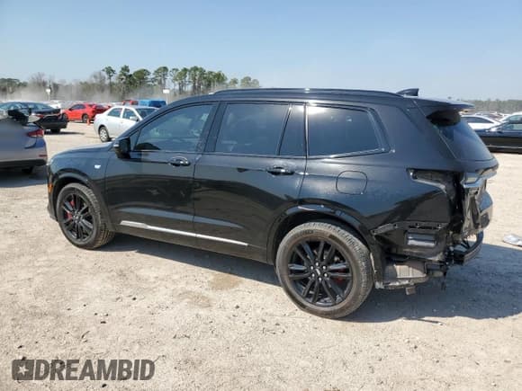 ✅ 2022 Cadillac XT6 Sport • VIN: 1GYKPHRS0NZ175482 • Lot: 47362325. Listed on Copart with 47,584 mi. Free auction sales archive from the USA and detailed vehicle history report at DreamBid. Image 2.
