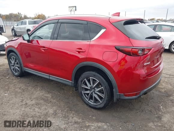 ✅ 2018 Mazda CX-5 Grand Touring • VIN: JM3KFADM4J0432206 • Lot: 43723615. Listed on IAAI with 81,130 mi. Free auction sales archive from the USA and detailed vehicle history report at DreamBid. Image 3.
