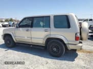 ✅ 2002 Isuzu Trooper S • VIN: JACDS58X527J08603 • Lot: 63357674. Listed on Copart with 218,282 mi. Free auction sales archive from the USA and detailed vehicle history report at DreamBid. Image 2.