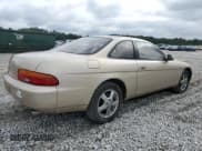 ✅ 1993 Lexus SC • VIN: JT8JZ31C8P0016752 • Lot: 65764515. Wystawiony na Copart z przebiegiem 146 935 mil. Bezpłatny archiwum sprzedaży aukcyjnych z USA i szczegółowy raport historii pojazdu na DreamBid. Zdjęcie 3.