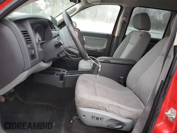 2008 Dodge Dakota SLT z VIN 1D7HE48NX8S505786, wystawiony jako Copart lot #86113494 z przebiegiem 128 937 mil mil oraz Szkoda całkowita • Salvage title. Historia ofert i sprzedaży dostępna na DreamBid. Obrazek 7.