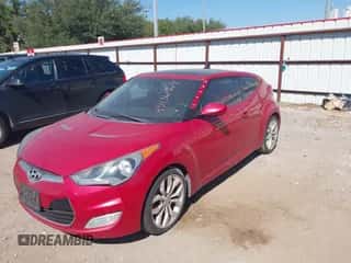 2012 Hyundai Veloster w/Gray Int with VIN KMHTC6AD1CU051606, listed as a IAAI auction lot 43436964 with 144,149 mi miles and . Bid and sale history available at DreamBid. Image 2.