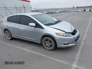 ✅ 2010 Honda Insight EX • VIN: JHMZE2H77AS042434 • Lot: 43723206. Listed on IAAI with 225,560 mi. Free auction sales archive from the USA and detailed vehicle history report at DreamBid. Image 1.