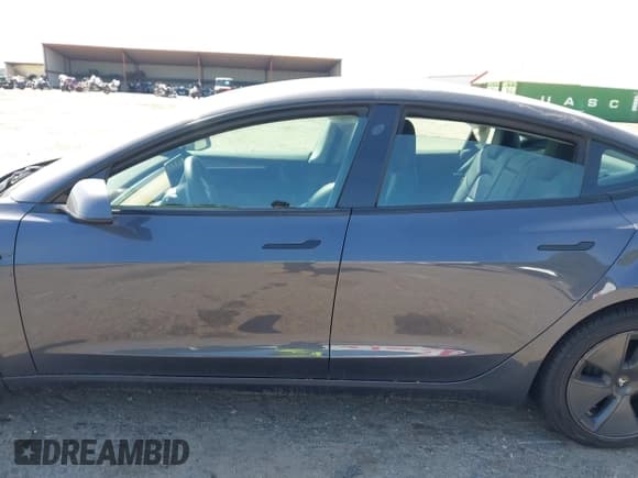 ✅ 2023 Tesla Model 3 • VIN: 5YJ3E1EA8PF400213 • Lot: 42117720. Listed on IAAI with 54,529 mi. Free auction sales archive from the USA and detailed vehicle history report at DreamBid. Image 13.