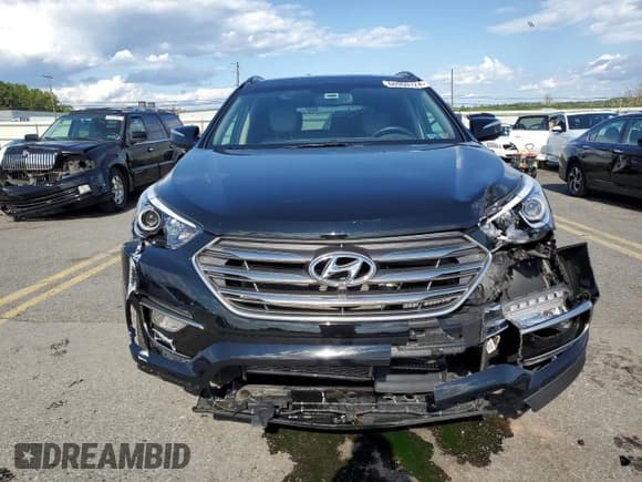 ✅ 2017 Hyundai Santa Fe Ultimate • VIN: 5XYZWDLA4HG389099 • Лот: 66960124. Опубликован ранее на Copart с пробегом 35 290 миль. Бесплатный доступ к архиву аукционных продаж из США и подробный отчёт об истории автомобиля на DreamBid. Изображение 5.