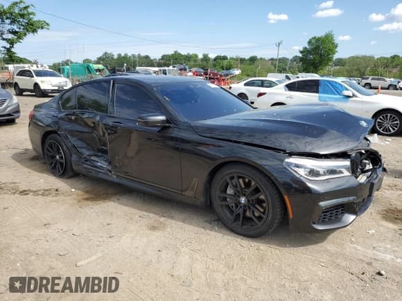 ✅ 2019 BMW 7 Series 750i xDrive • VIN: WBA7B0C54KG527501 • Lot: 56208675. Wystawiony na Copart z przebiegiem 34 471 mil. Bezpłatny archiwum sprzedaży aukcyjnych z USA i szczegółowy raport historii pojazdu na DreamBid. Zdjęcie 4.