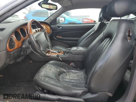 ✅ 2002 Jaguar XK • VIN: SAJDA41C32NA30179 • Lot: 76567484. Wystawiony na Copart z przebiegiem Nie podano. Bezpłatny archiwum sprzedaży aukcyjnych z USA i szczegółowy raport historii pojazdu na DreamBid. Zdjęcie 7.