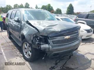 2011 Chevrolet Suburban LT z VIN 1GNSKJE38BR175243, wystawiony jako IAAI lot #43004139 z przebiegiem 213 604 mil mil oraz . Historia ofert i sprzedaży dostępna na DreamBid. Obrazek 1.