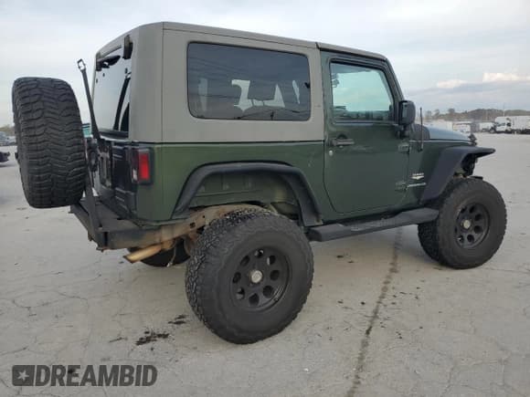 ✅ 2007 Jeep Wrangler Sahara • VIN: 1J4FA54127L153246 • Lot: 91785035. Listed on Copart with 107,994 mi. Free auction sales archive from the USA and detailed vehicle history report at DreamBid. Image 3.