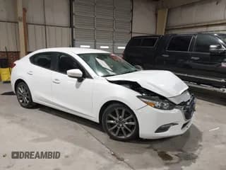 ✅ 2018 Mazda 3 Touring • VIN: 3MZBN1V33JM203107 • Лот: 43562890. Опубликован ранее на IAAI с пробегом 124 557 миль. Бесплатный доступ к архиву аукционных продаж из США и подробный отчёт об истории автомобиля на DreamBid. Изображение 1.