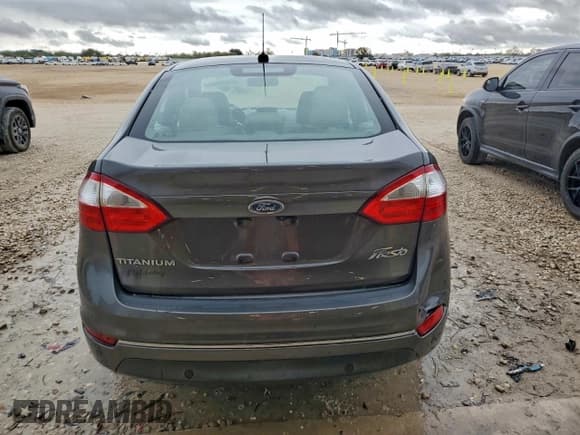 ✅ 2015 Ford Fiesta Titanium • VIN: 3FADP4CJ4FM110781 • Lot: 91611685. Wystawiony na Copart z przebiegiem 108 612 mil. Bezpłatny archiwum sprzedaży aukcyjnych z USA i szczegółowy raport historii pojazdu na DreamBid. Zdjęcie 6.