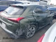 ✅ 2021 Lexus UX 250h • VIN: JTHX9JBH8M2043538 • Lot: 43472440. Listed on IAAI with 99,992 mi. Free auction sales archive from the USA and detailed vehicle history report at DreamBid. Image 4.