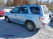 2009 Mercury Mariner Premier with VIN 4M2CU97739KJ14224, listed as a IAAI auction lot 43552437 with 103,277 mi miles and . Bid and sale history available at DreamBid. Image 3.