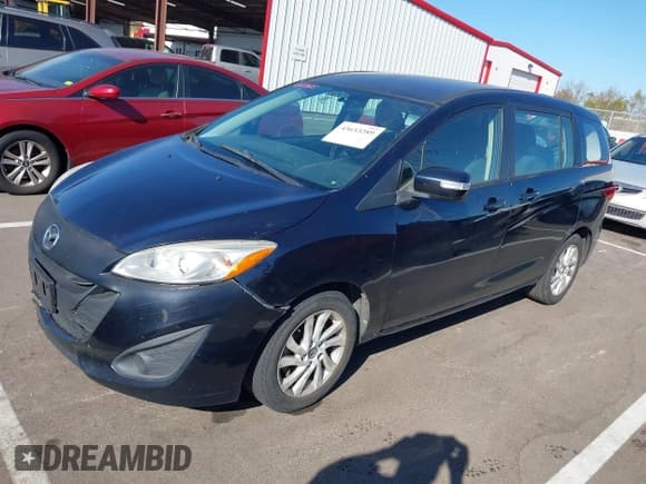 ✅ 2014 Mazda 5 Sport • VIN: JM1CW2BL3E0176689 • Lot: 43653289. Listed on IAAI with 218,041 mi. Free auction sales archive from the USA and detailed vehicle history report at DreamBid. Image 2.