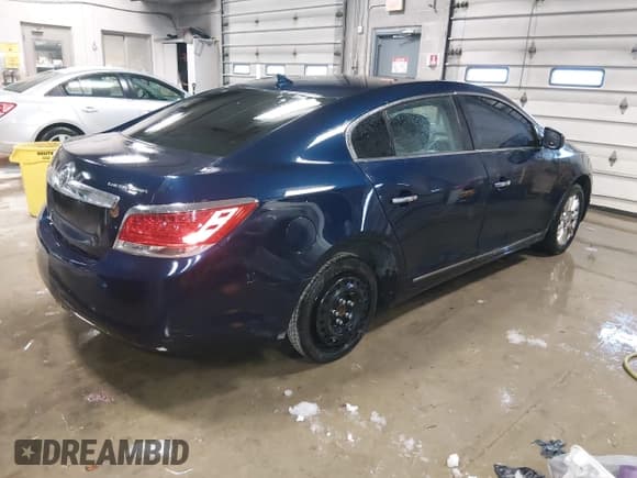 ✅ 2011 Buick LaCrosse CX • VIN: 1G4GA5ED5BF194461 • Lot: 43712685. Listed on IAAI with 193,991 mi. Free auction sales archive from the USA and detailed vehicle history report at DreamBid. Image 4.