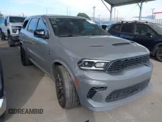 ✅ 2023 Dodge Durango SRT Hellcat • VIN: 1C4SDJH99PC689292 • Lot: 43833951. Listed on IAAI with 22,419 mi. Free auction sales archive from the USA and detailed vehicle history report at DreamBid. Image 1.