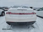 ✅ 2014 Lincoln MKZ Hybrid • VIN: 3LN6L2LU6ER800607 • Лот: 94232575. Опубликован ранее на Copart с пробегом 126 607 миль. Бесплатный доступ к архиву аукционных продаж из США и подробный отчёт об истории автомобиля на DreamBid. Изображение 6.