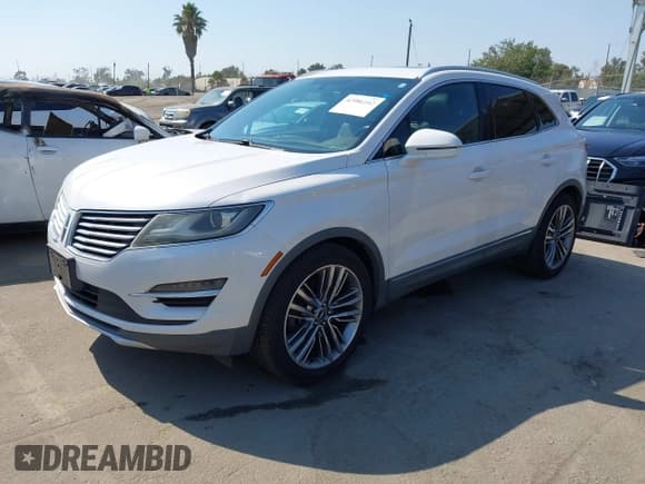 ✅ 2015 Lincoln MKC • VIN: 5LMTJ2AH3FUJ20590 • Lot: 42986142. Wystawiony na IAAI z przebiegiem 156 820 mil. Bezpłatny archiwum sprzedaży aukcyjnych z USA i szczegółowy raport historii pojazdu na DreamBid. Zdjęcie 2.