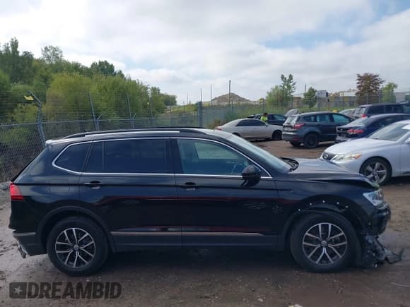 ✅ 2021 Volkswagen Tiguan SE • VIN: 3VV2B7AXXMM013964 • Лот: 43291856. Опубликован ранее на IAAI с пробегом 64 614 миль. Бесплатный доступ к архиву аукционных продаж из США и подробный отчёт об истории автомобиля на DreamBid. Изображение 13.